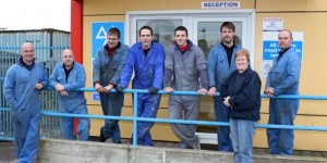 The P&L Motors team outside their new home