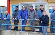 The P&L Motors team outside their new home