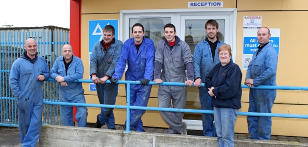 The P&L Motors team outside their new home