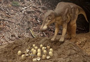 Hadrosaur mother with hatchlings © The Natural History Museum London
