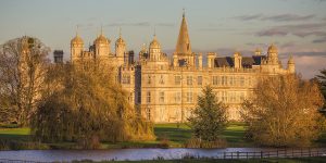 Burghley House, a large Elizabeth 16th century mansion, in parkland created in the 18th century by Capability Brown.